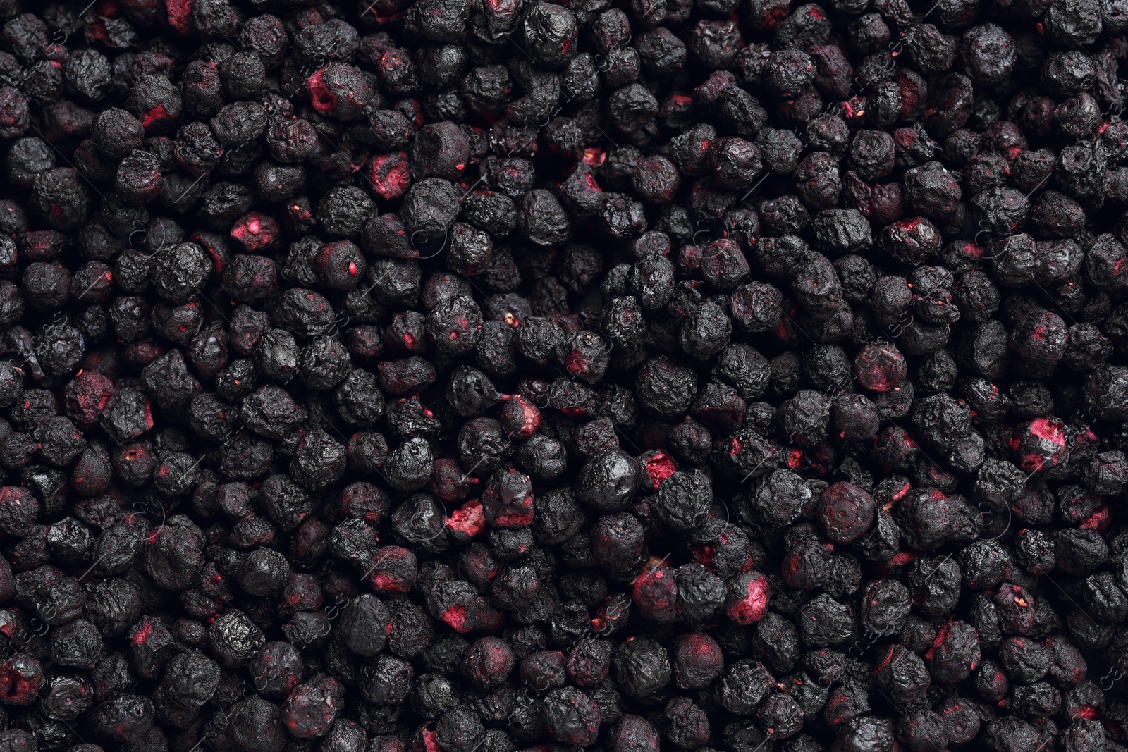 Photo of Closeup of freeze dried blueberries as background, top view