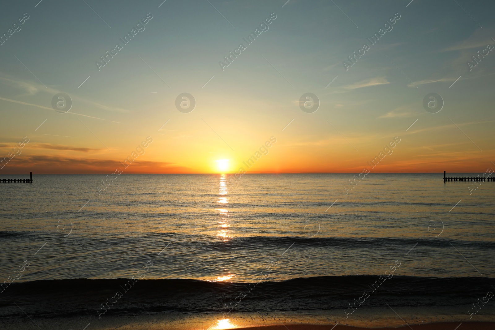 Picturesque view of beautiful sea at sunset Photo of Picturesque view of beautiful sea at sunset