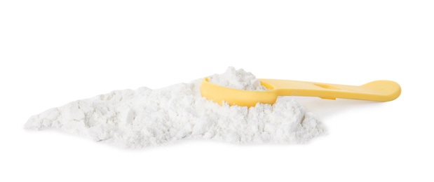 Spoon and pile of protein powder isolated on white