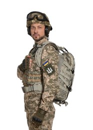 Photo of Soldier in Ukrainian military uniform with tactical goggles and backpack on white background