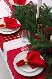 Photo of Beautiful festive table setting with Christmas decor