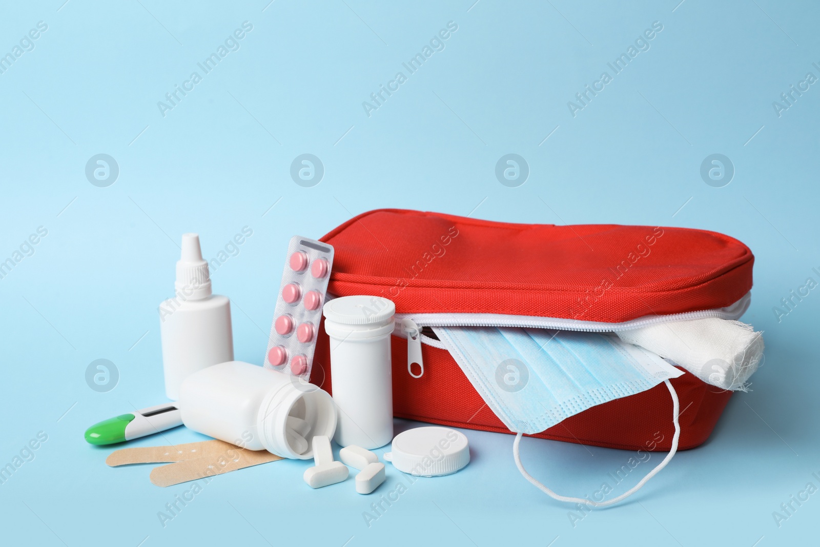 Photo of First aid kit on color background. Health care