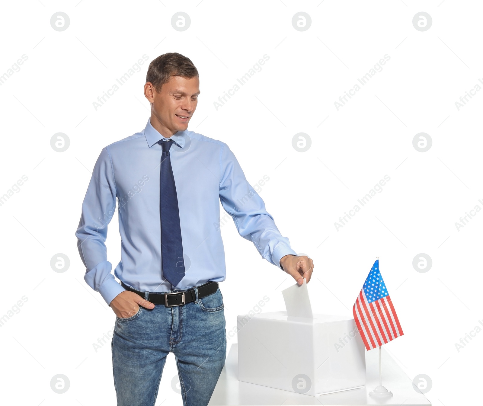 Photo of Man putting ballot paper into box against white background