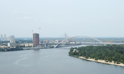 Beautiful cityscape with modern bridge over river