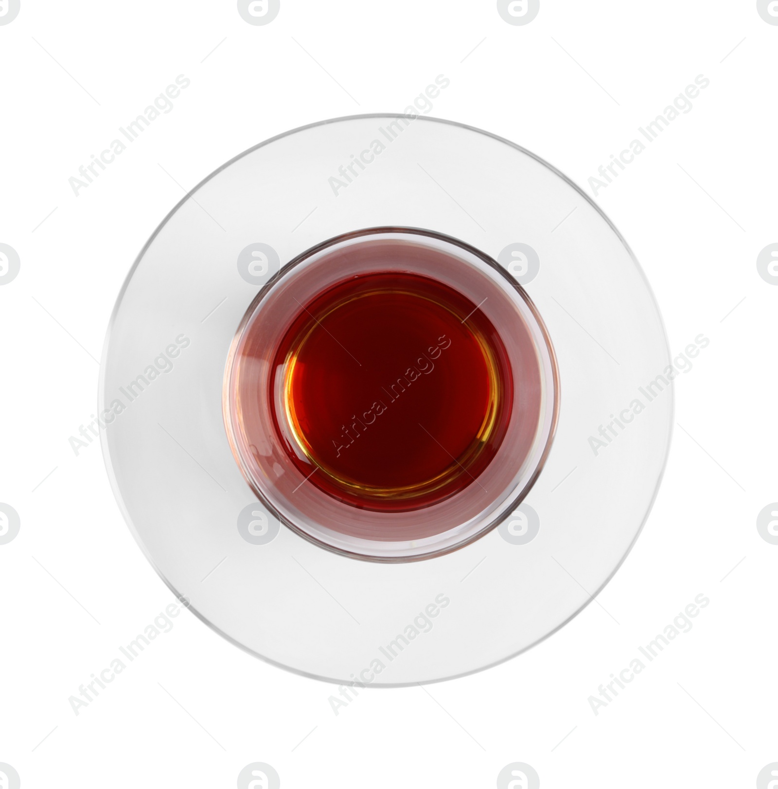 Photo of Glass of traditional Turkish tea isolated on white, top view