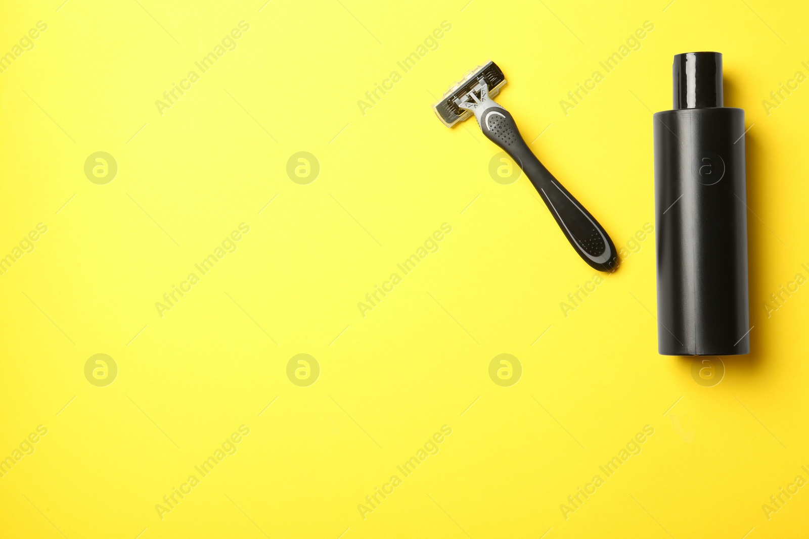 Photo of Flat lay composition with men's shaving accessories and space for text on color background