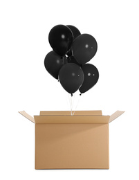 Image of Black Friday concept. Box with bunch of balloons on white background