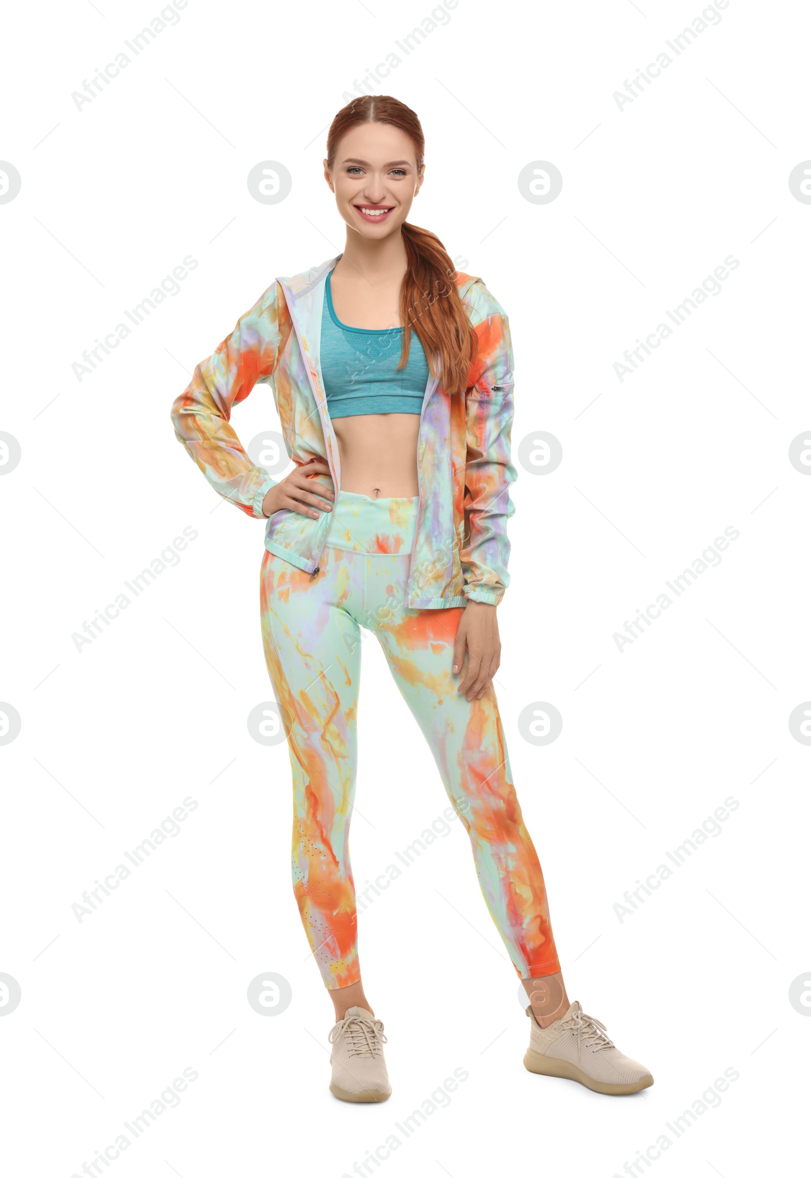 Photo of Young woman wearing sportswear on white background