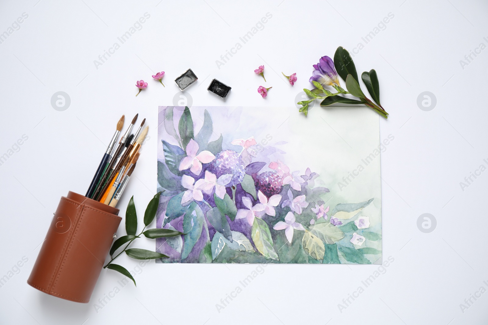 Photo of Flat lay composition with watercolor paints and floral picture on white background