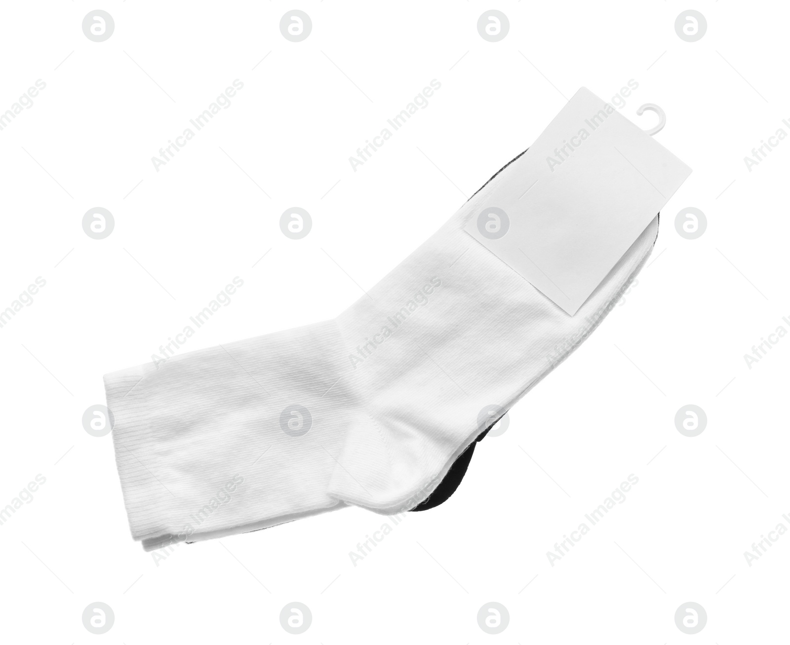 Photo of New pairs of socks on white background