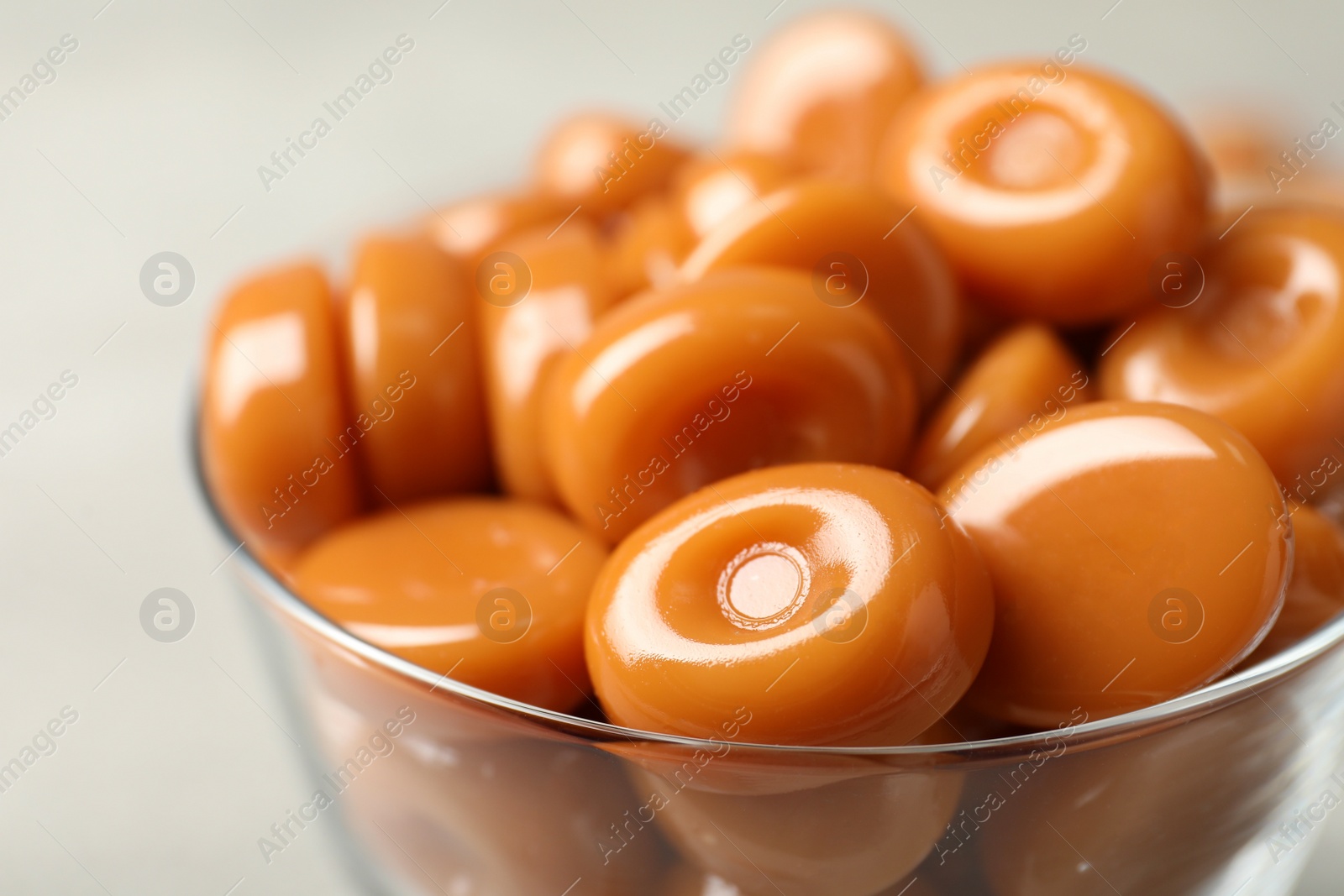 Photo of Dessert bowl filled with tasty candies, closeup