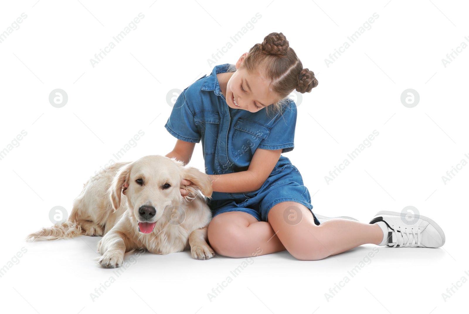 Photo of Cute little child with her pet on white background