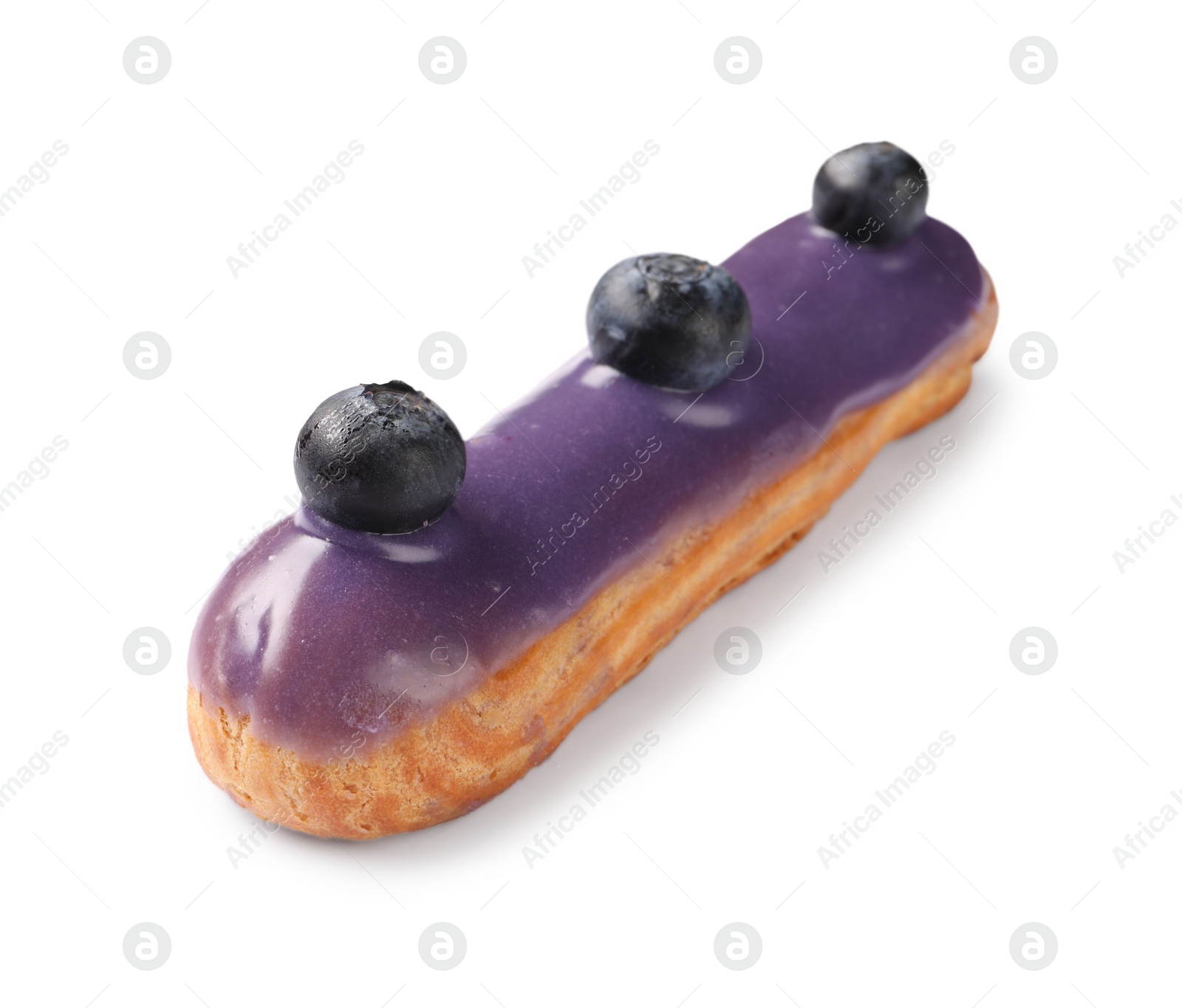 Photo of Delicious eclair decorated with blueberries isolated on white