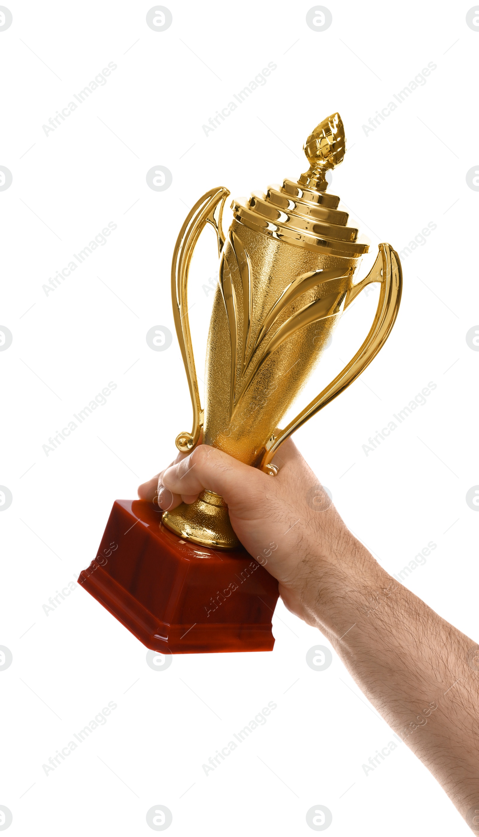 Photo of Young man holding gold trophy cup on white background, closeup