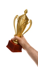 Photo of Young man holding gold trophy cup on white background, closeup