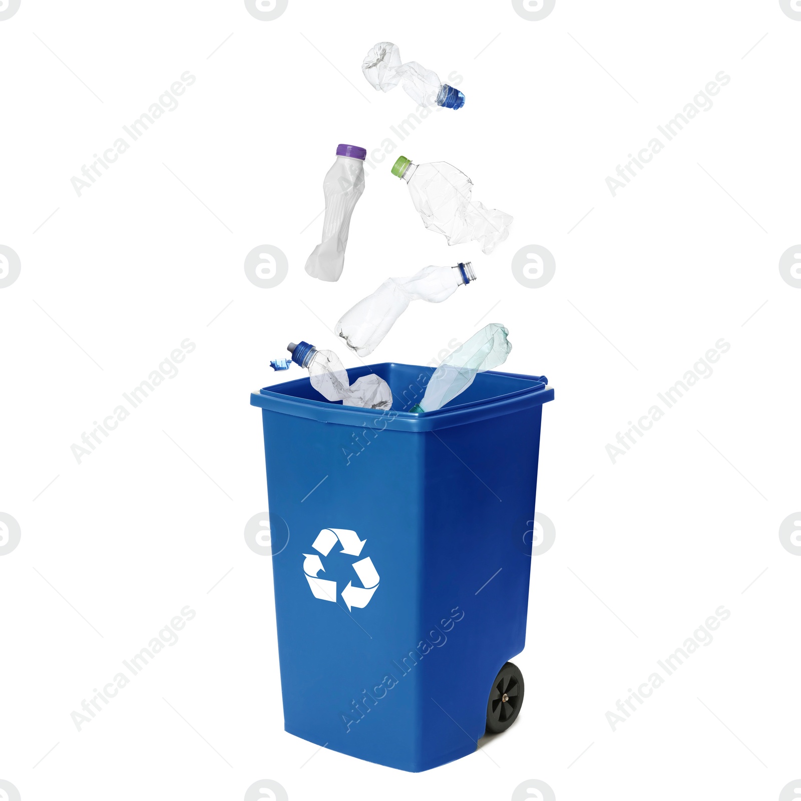 Image of Garbage falling into trash bin on white background