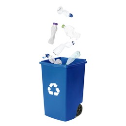 Image of Garbage falling into trash bin on white background