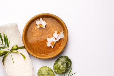 Photo of Flat lay composition with different spa products on white background. Space for text