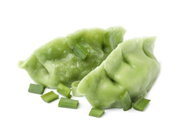Photo of Two delicious green dumplings (gyozas) and onion isolated on white