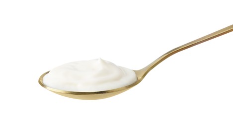 Photo of One golden spoon with mayonnaise isolated on white