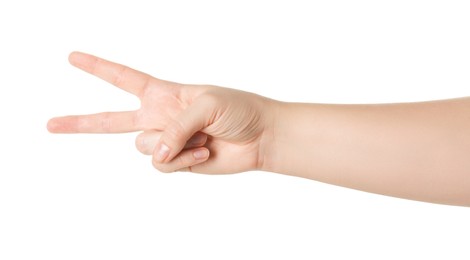 Photo of Playing rock, paper and scissors. Woman making scissors with her fingers on white background, closeup
