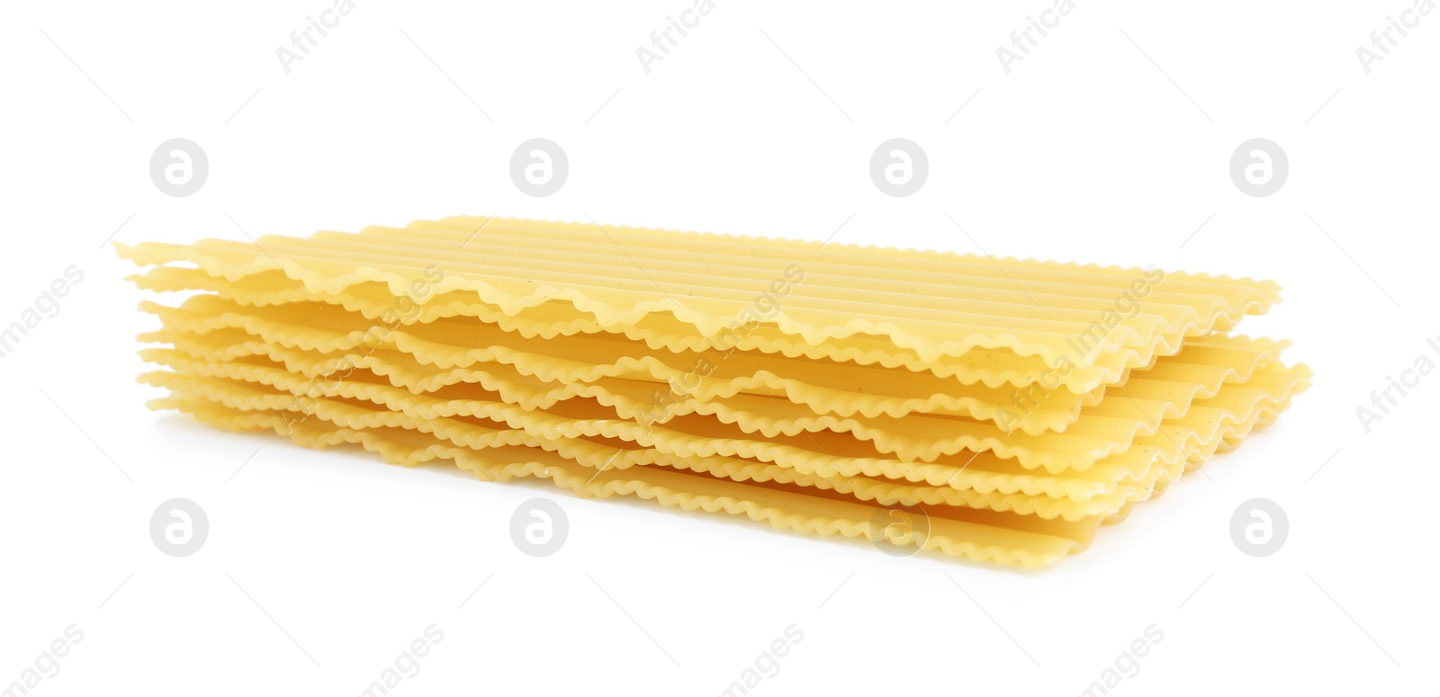 Photo of Stack of uncooked lasagna sheets isolated on white