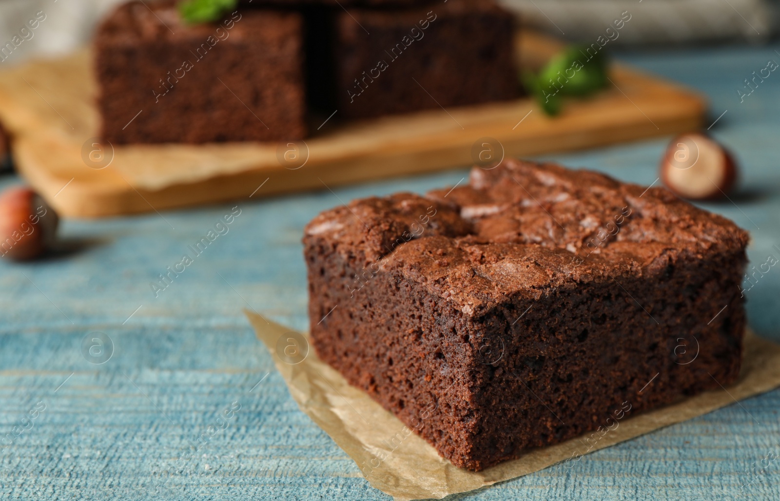 Photo of Fresh brownie on table, closeup with space for text. Delicious chocolate pie