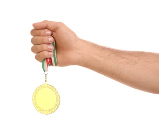 Photo of Man holding golden medal on white background, closeup. Space for design