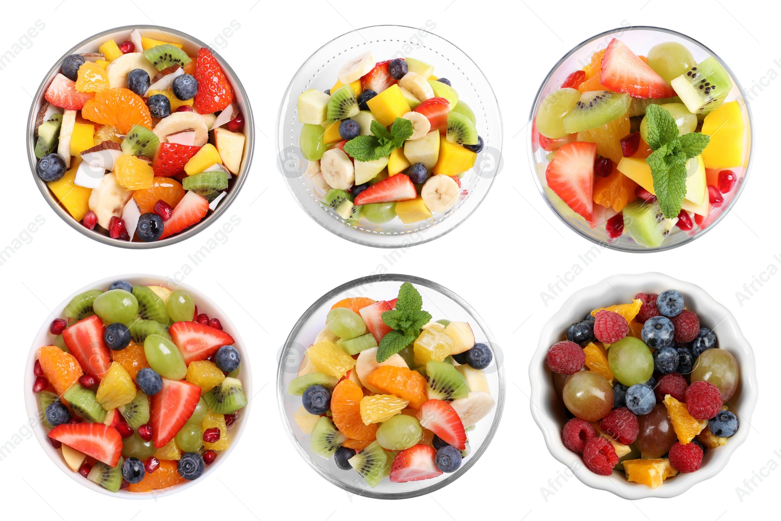 Image of Fruit salad, collection. Mixed fresh berries and fruits in bowls isolated on white, top view