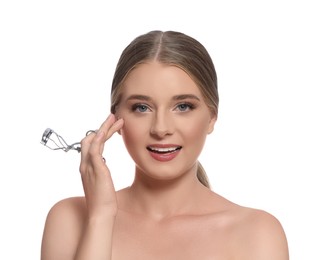 Photo of Young woman with eyelash curler on white background