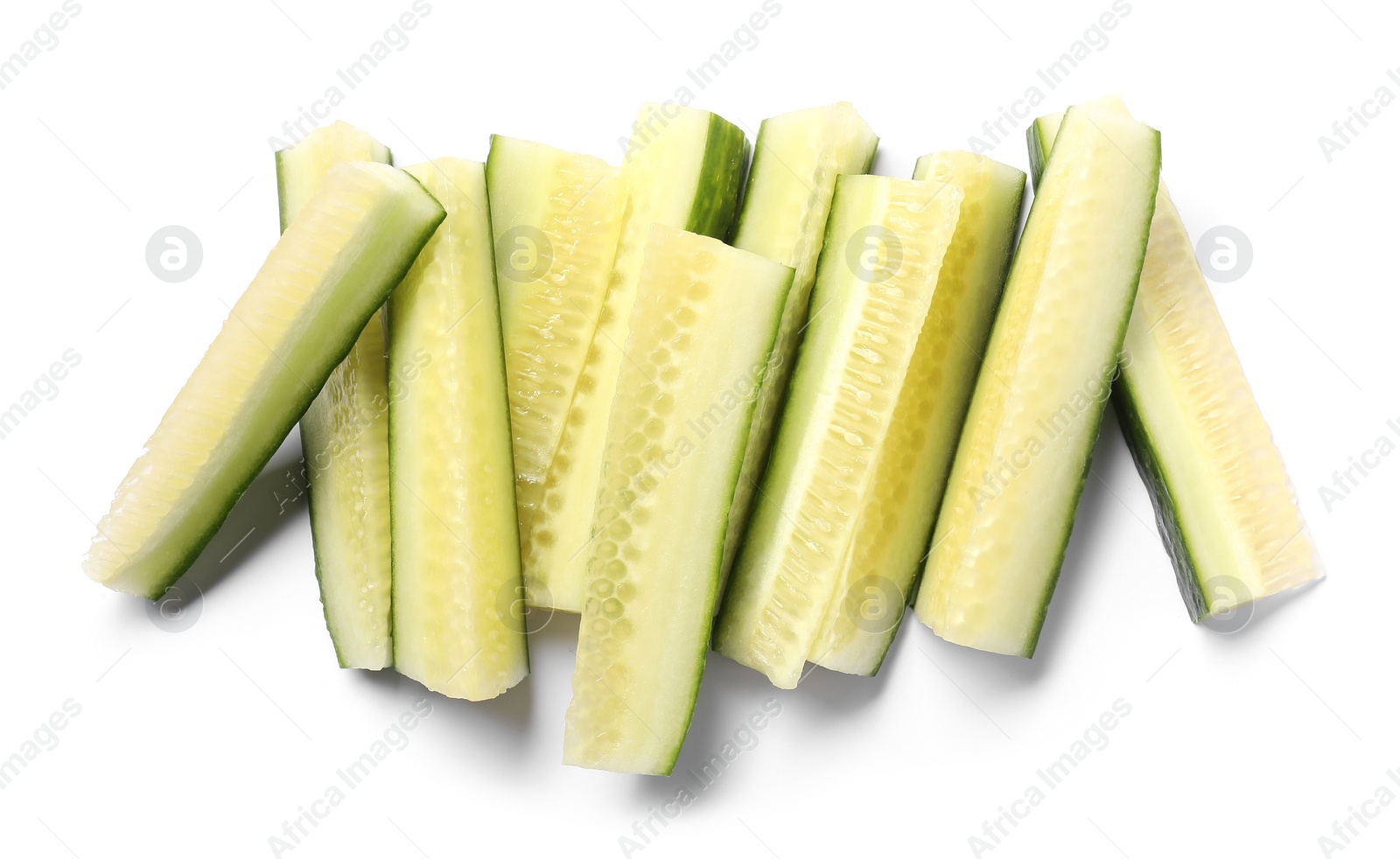 Photo of Pieces of fresh cucumber isolated on white, top view