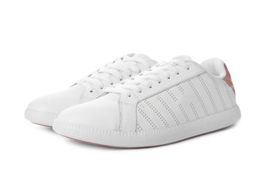 Photo of Pair of trendy sneakers on white background