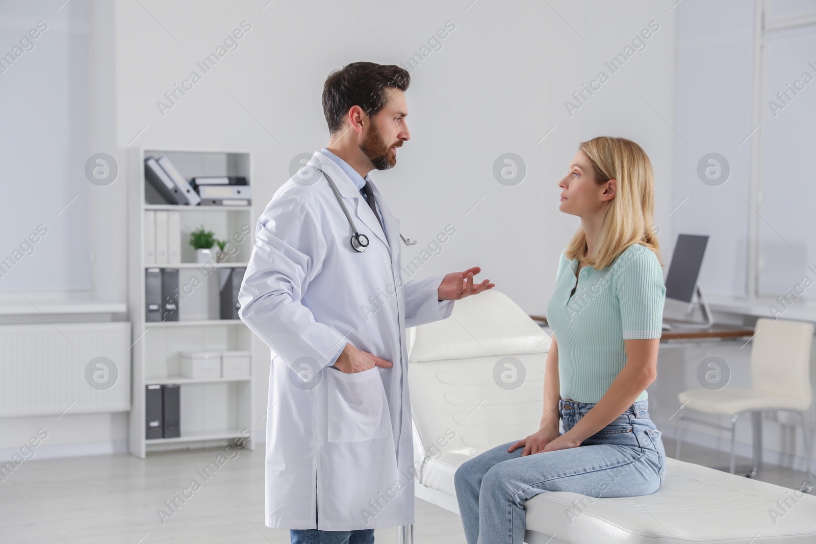 Photo of Patient having appointment with doctor in clinic