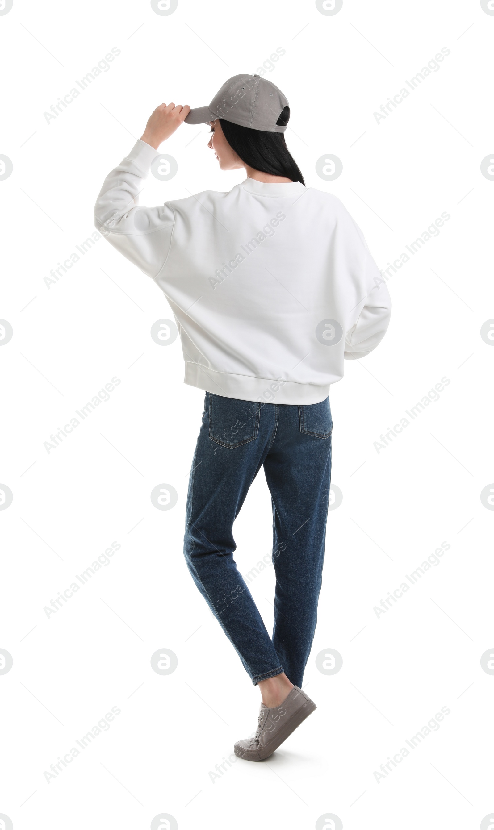 Photo of Young woman in sweater isolated on white. Mock up for design