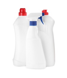 Photo of Bottles of different cleaning products on white background