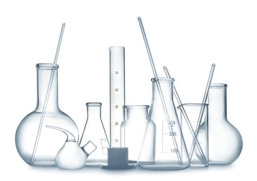 Photo of Empty clean laboratory glassware on white background