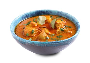 Photo of Bowl of delicious chicken curry on white background