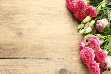 Photo of Happy Mother's Day. Beautiful flowers on wooden table, flat lay. Space for text