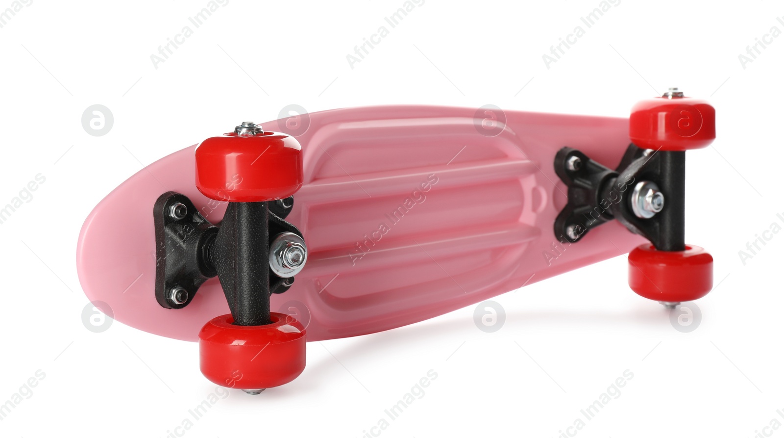 Photo of Pink skateboard with red wheels isolated on white. Sport equipment