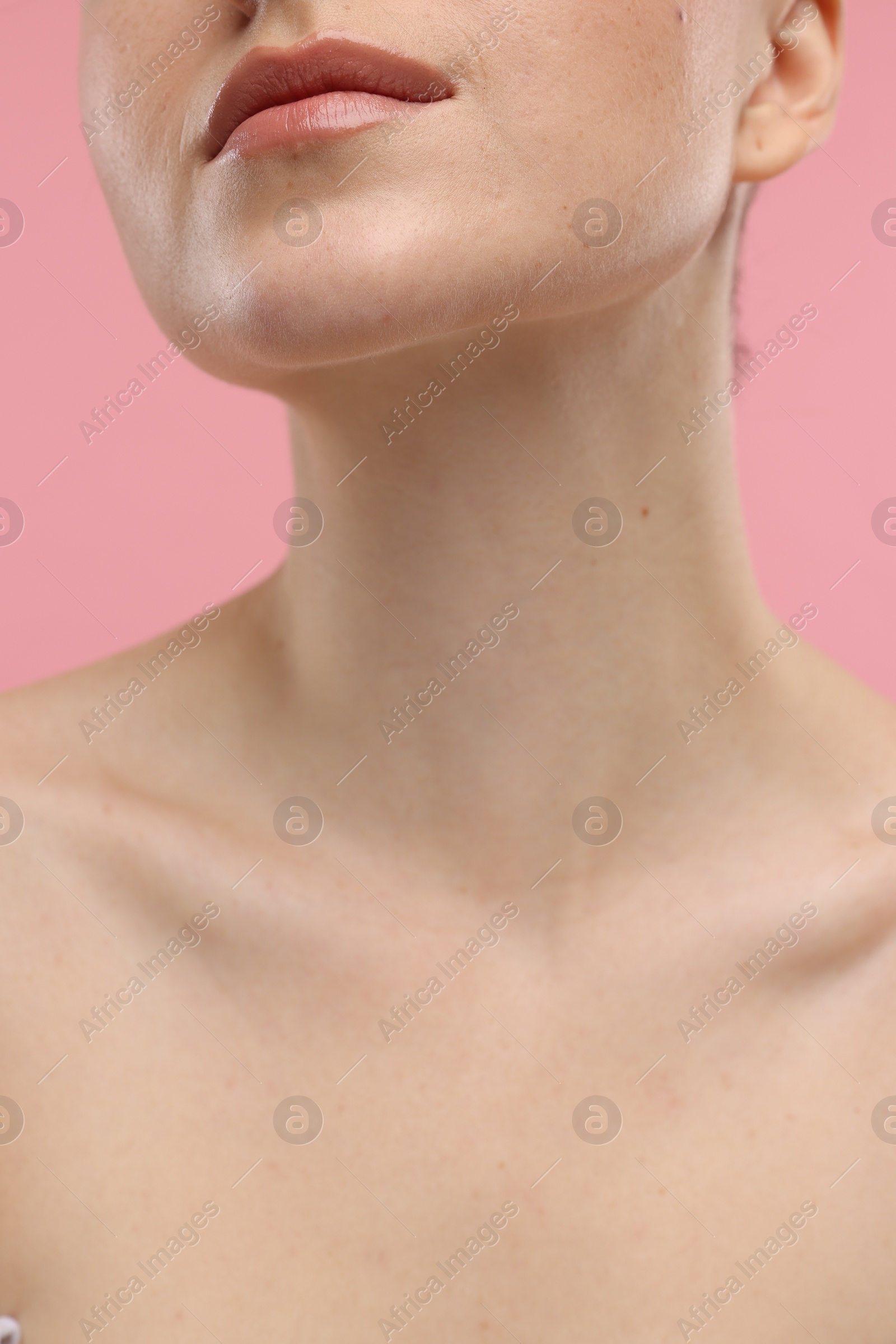 Photo of Beauty concept. Woman on pink background, closeup