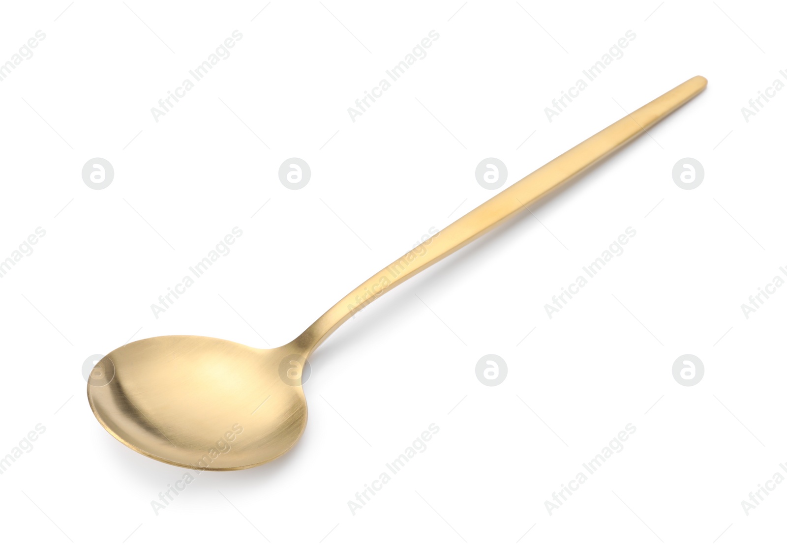 Photo of One shiny golden spoon isolated on white