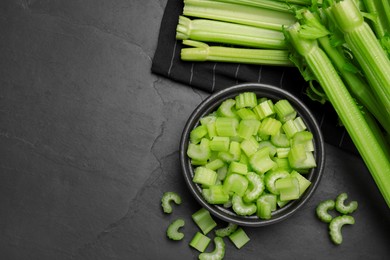 Fresh ripe celery on grey table, flat lay. Space for text