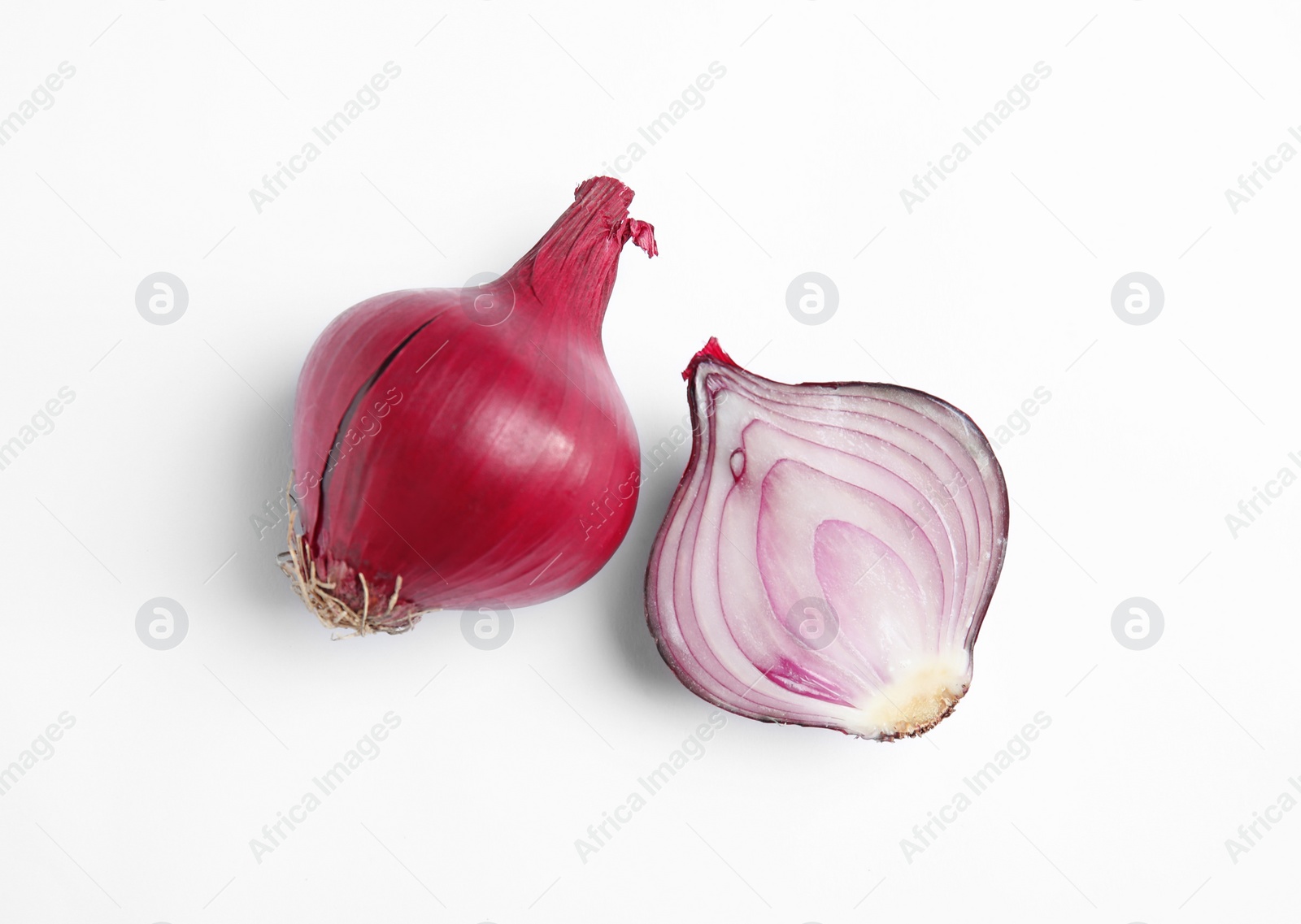 Photo of Ripe red onions on white background