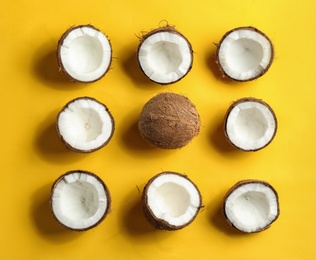 Photo of Coconut pattern on color background, flat lay