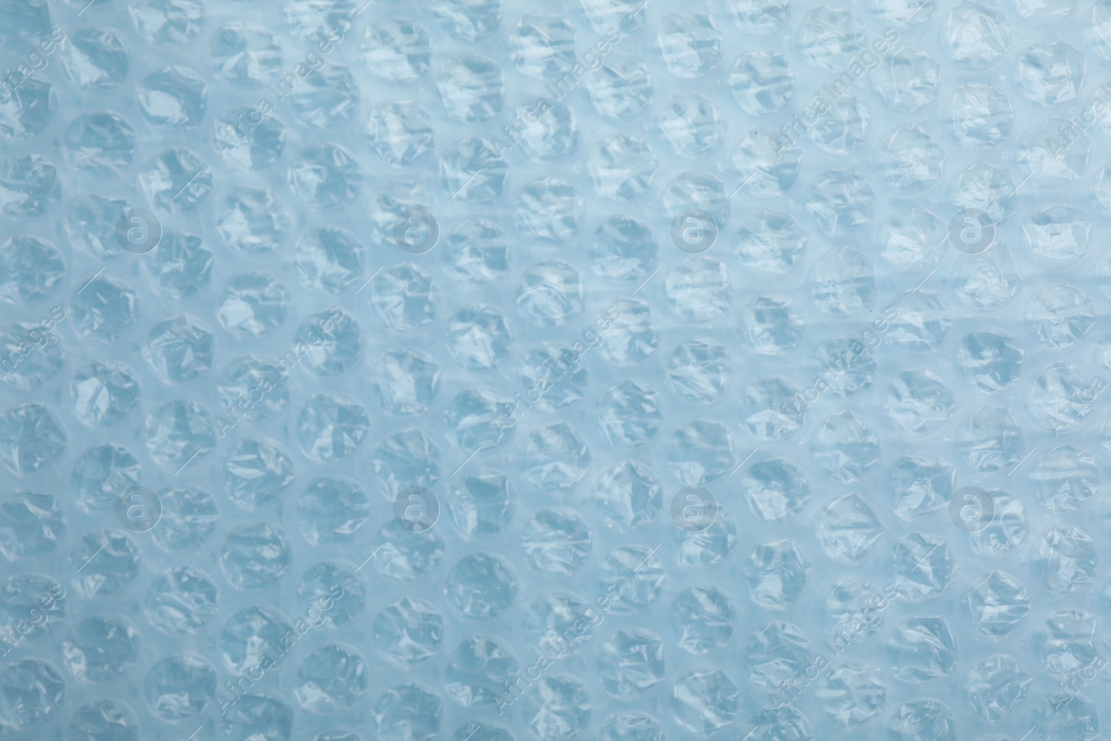 Photo of Texture of bubble wrap as background, top view