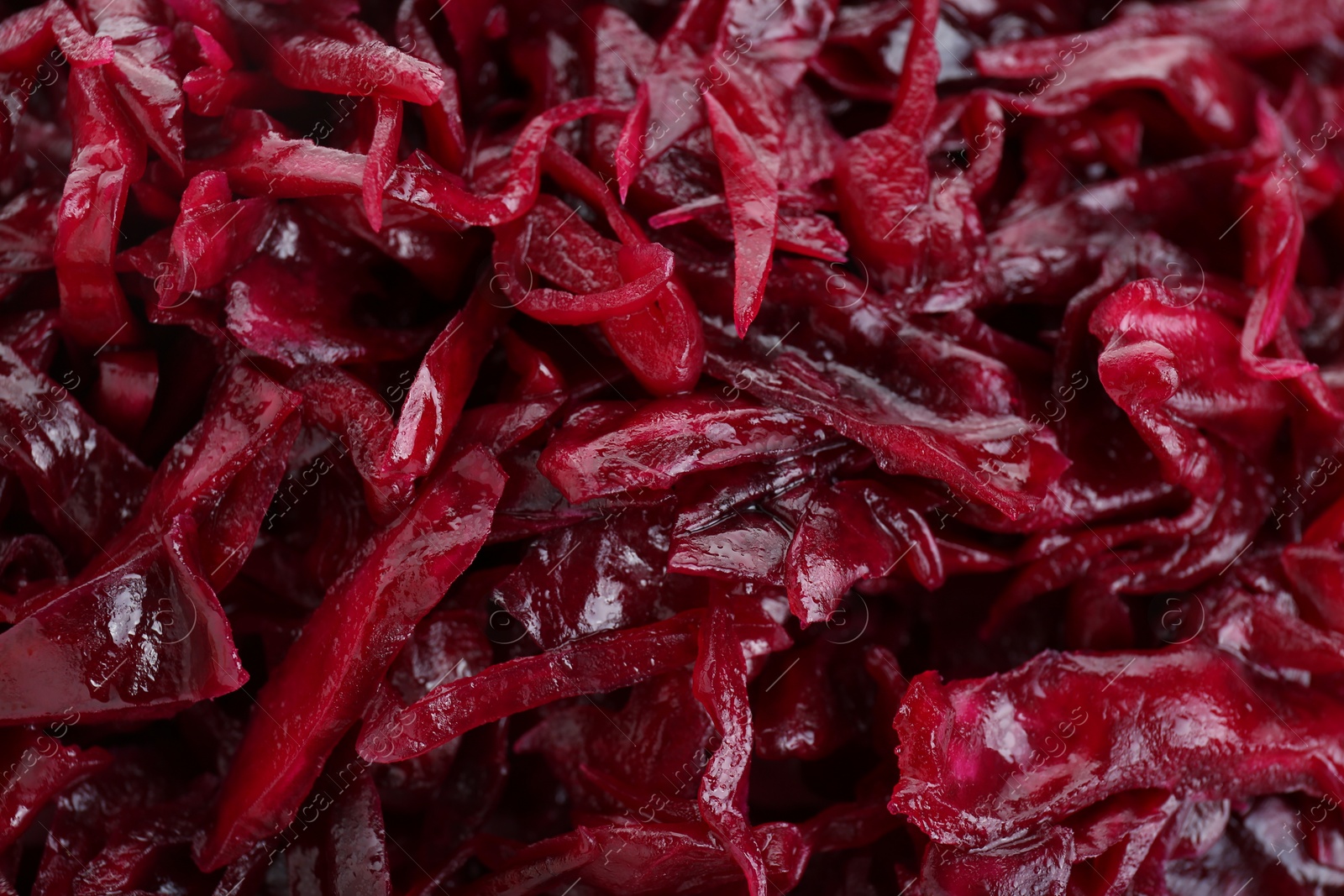 Photo of Tasty red cabbage sauerkraut as background, closeup