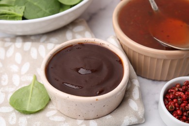 Fresh homemade marinade in bowl on table, closeup