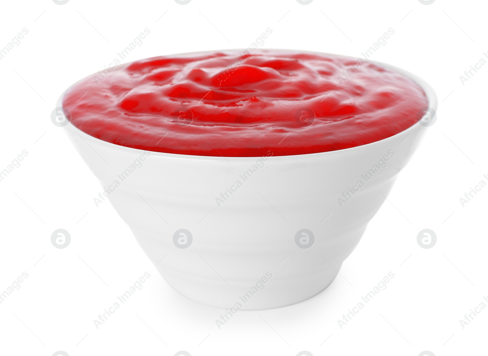 Photo of Bowl with red sauce isolated on white