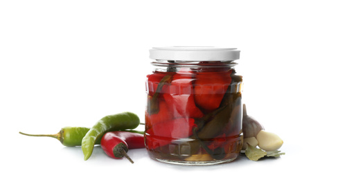 Photo of Jar of pickled peppers and fresh ingredients on white background