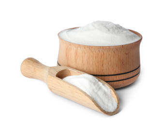 Photo of Baking soda in wooden bowl and scoop isolated on white